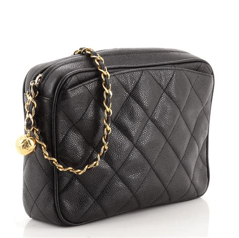 chanel vintage quilted camera bag.